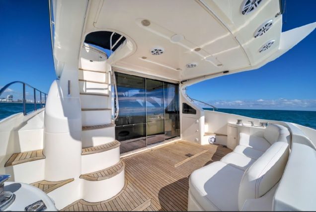 Blessed 55ft Azimut boarding area with easy access to upper deck