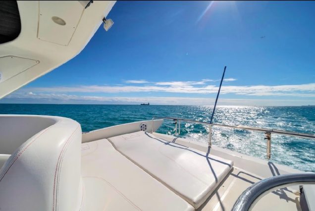 Blessed 55ft Azimut upper deck ideal for relaxing and enjoying open-air cruising