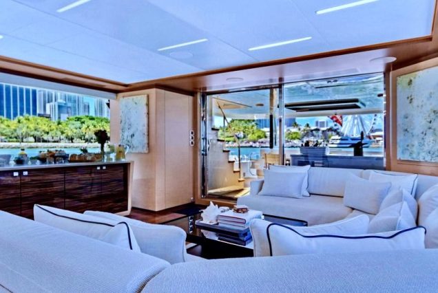 VIP 95ft Ocean Alexander Yacht With Jacuzzi sophisticated lounge with table for social gatherings