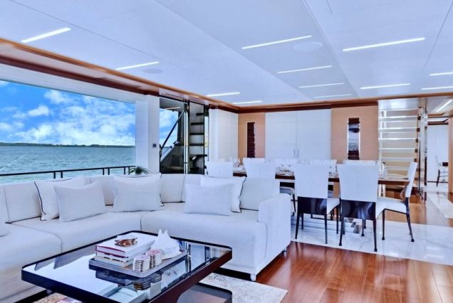 VIP 95ft Ocean Alexander Yacht With Jacuzzi sophisticated lounge with table for social gatherings