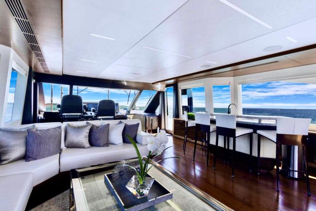 VIP 95ft Ocean Alexander Yacht With Jacuzzi sophisticated lounge with table for social gatherings