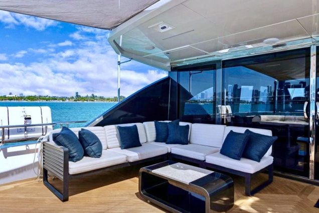 VIP 95ft Ocean Alexander Yacht With Jacuzzi grand boarding entrance with VIP seating area.