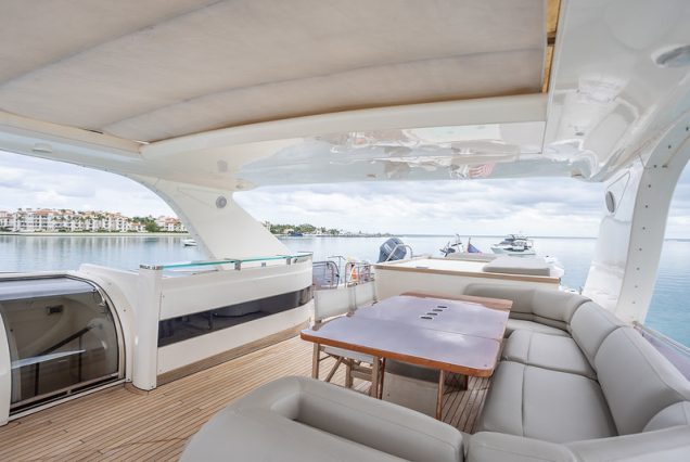 88ft Princess PFO upper deck seating with table for dining and cocktails