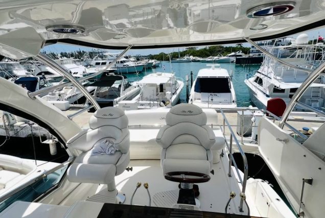 54ft Sea Ray (Sedan Bridge) upper deck seating area with table for drinks and casual dining