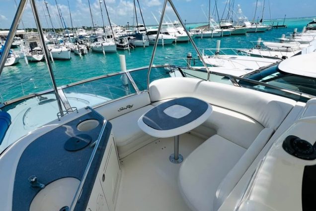 54ft Sea Ray (Sedan Bridge) upper deck seating area with table for drinks and casual dining