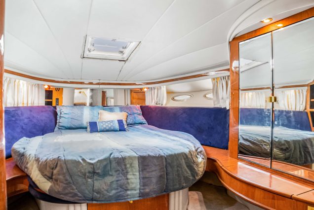 50ft Sea Ray Yacht master cabin with private bathroom for a relaxed onboard stay