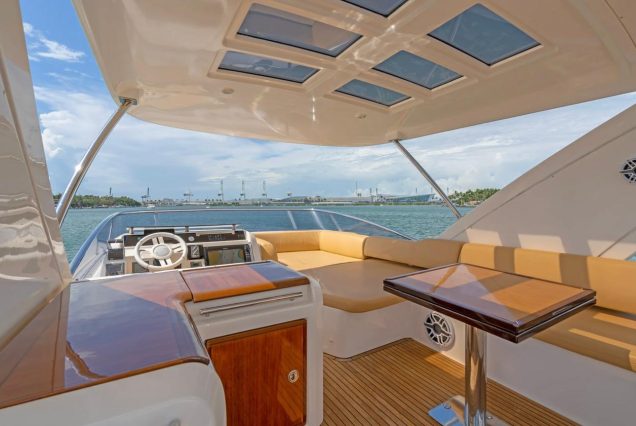65ft Azimut Ram upper deck lounge with table Miami Marina sunset cruise