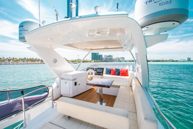 55ft Azimut “Salty At Sea” upper deck seating area with table for drinks and light dining