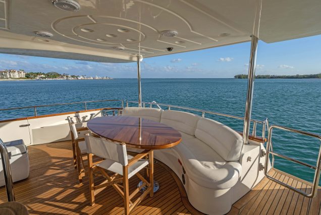 90ft Azimut Dream With Jacuzzi entrance gate with table and chairs Miami Marina rental