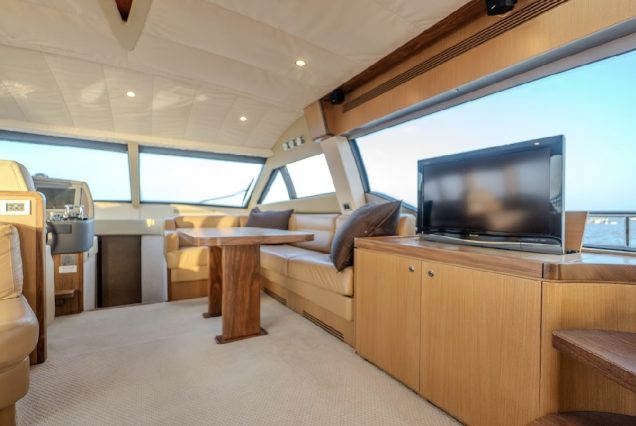 68ft Ferretti Yacht interior dining area ideal for meals and celebrations.