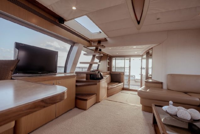 68ft Ferretti Yacht elegant indoor salon with comfortable seating.