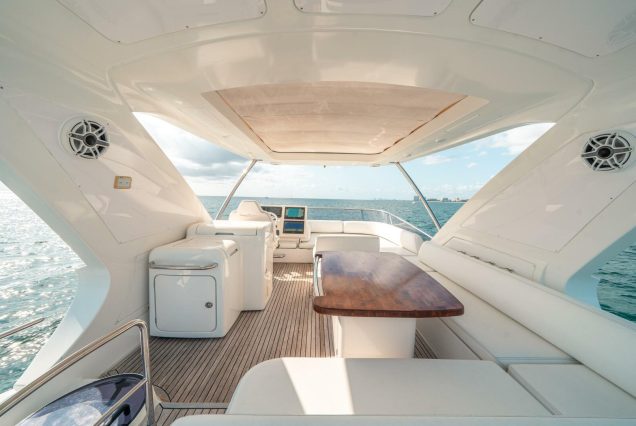 70ft Azimut WARRIOR II upper deck seating area with table for drinks and dining