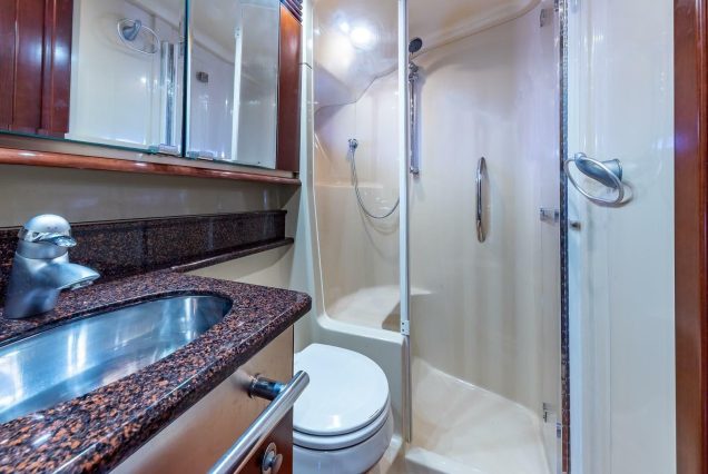 54ft Sea Ray (Sedan Bridge) clean and modern washroom with essential amenities