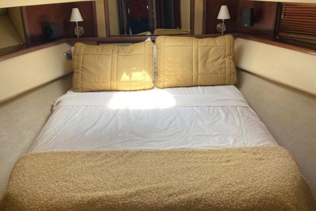 54ft Sea Ray (Sedan Bridge) guest cabin with comfortable sleeping space for overnight charters