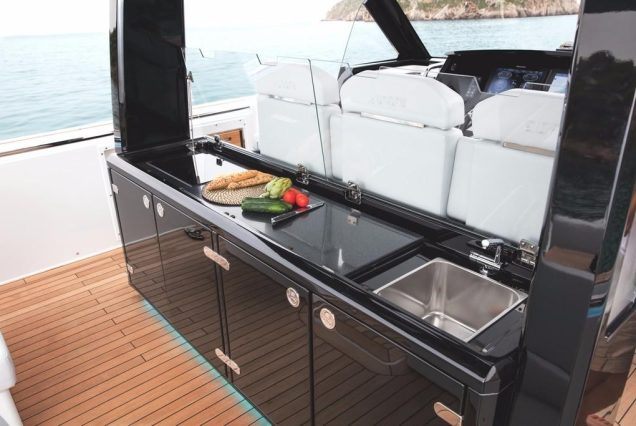 Luxury 48ft Fjord fully equipped galley with clean and modern layout
