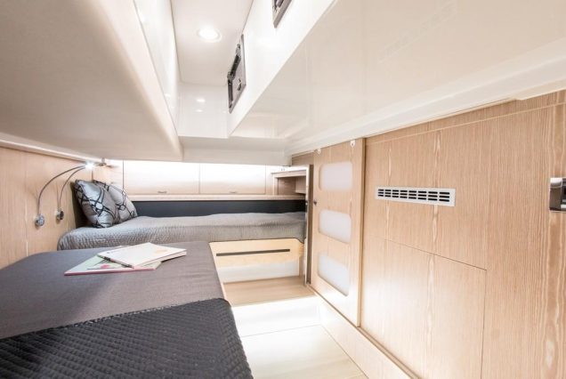 Luxury 48ft Fjord spacious master bedroom offering comfort and privacy at sea