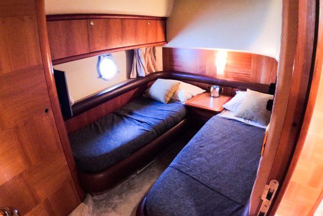 Azimut 57ft Modern Yacht guest cabin with comfortable sleeping space for charter stays