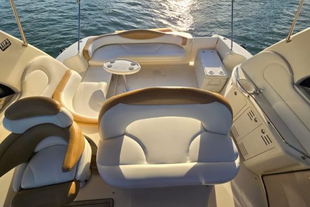 Sun-kissed 45ft Sea Ray Yacht front deck seating with beautiful waterfront views