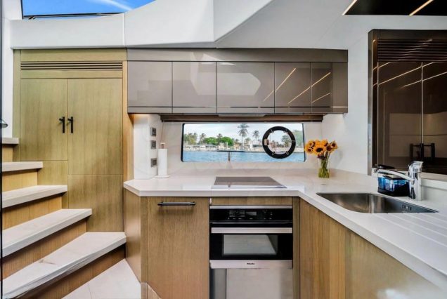 Luxury 74ft Sunseeker Predator Miami fully equipped galley with sleek modern finishes and premium appliances