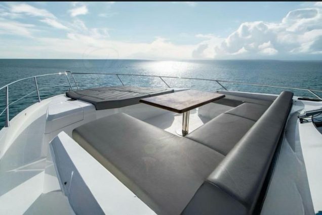 Luxury 74ft Sunseeker Predator Miami bow lounge area with stunning waterfront and skyline views