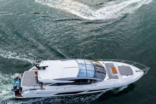 Luxury 74ft Sunseeker Predator Miami bow lounge area with stunning waterfront and skyline views