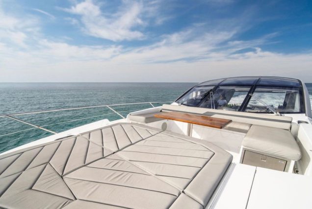 Luxury 74ft Sunseeker Predator Miami spacious sunbed area perfect for relaxing under the sun