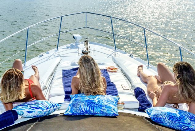Modern 50ft White Ace Sea Ray Yacht bow sunbed perfect for relaxing under the sun