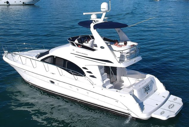 Modern 50ft White Ace Sea Ray Yacht swim platform with easy water access