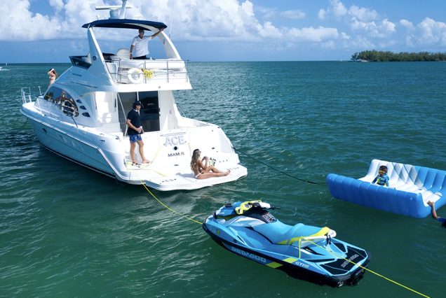 Modern 50ft White Ace Sea Ray Yacht swim platform with easy water access