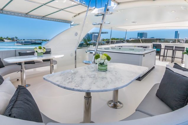 110ft Horizon “The Nirvana” upper deck seating with table for fine dining and cocktails