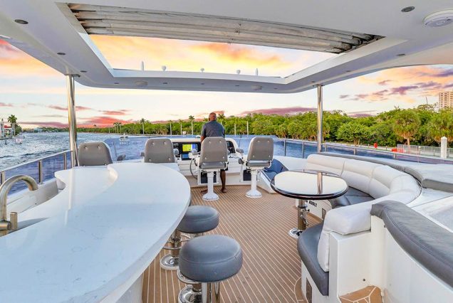 100ft Hargrave Yacht Miami expansive flybridge lounge perfect for upscale entertaining and social cruising