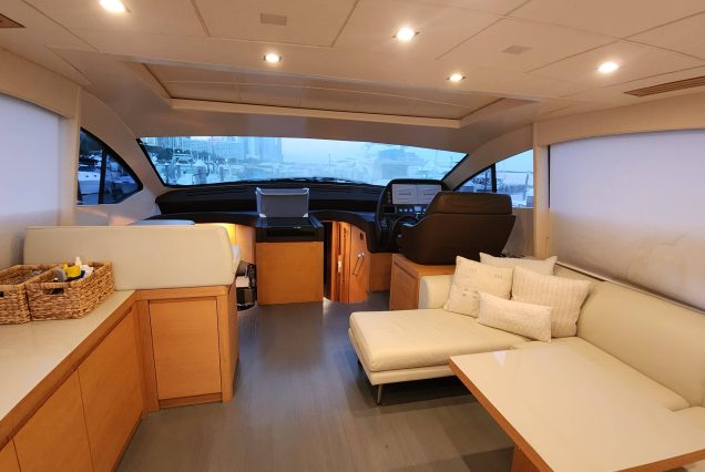 Luxury 64ft Pershing Wind Miami seamless interior flow connecting to outdoor deck areas