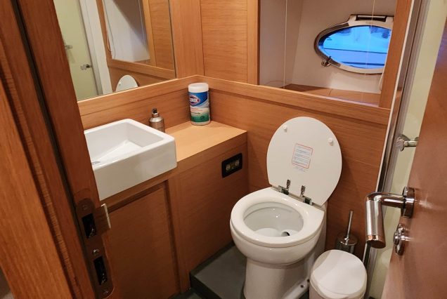 Luxury 64ft Pershing Wind Miami luxury washroom with premium fittings and modern styling