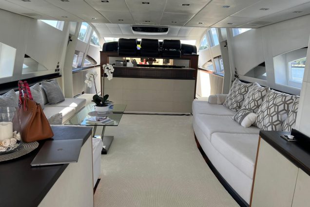 Luxury 105ft Leopard Miami sophisticated indoor salon with plush seating and elegant décor
