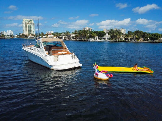40ft Sea Ray Esplanade Miami swim platform with easy water access with floating mat.