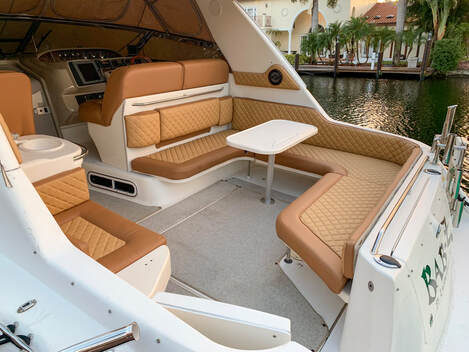 40ft Sea Ray Esplanade Miami seating area with table ideal for drinks and casual gatherings