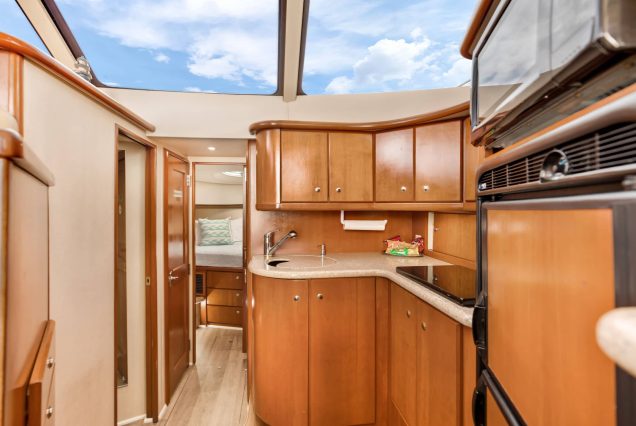 41ft Silverton Miami fully equipped galley with sleek modern finishes