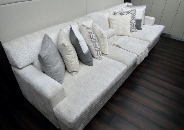 Luxury 105ft Leopard Miami sophisticated indoor salon with plush seating and elegant décor