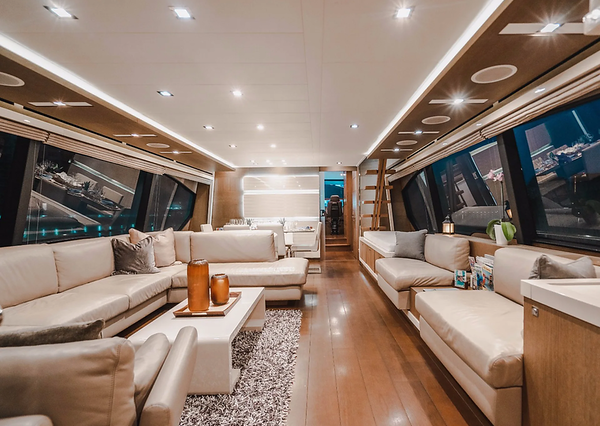 Top Shelf 87ft Ferretti Miami sophisticated indoor salon with plush seating and elegant décor