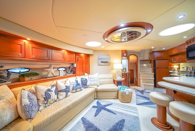 Good To Be Me 60ft Cruiser Miami sophisticated indoor salon with plush seating and elegant décor