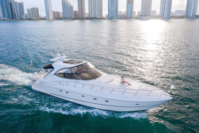Good To Be Me 60ft Cruiser Miami bow lounge area with breathtaking waterfront and skyline views