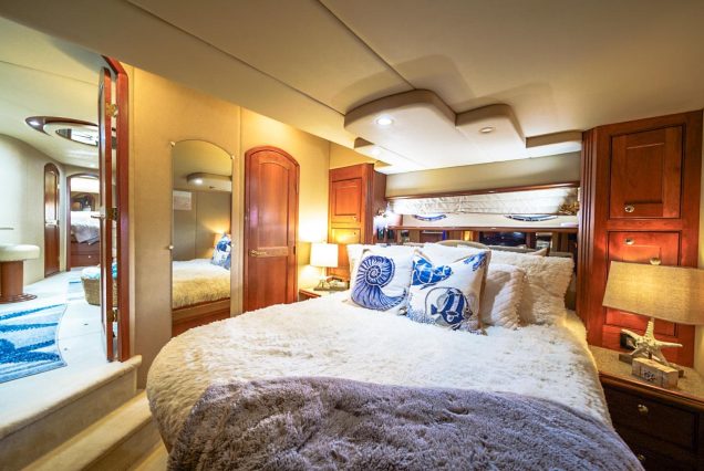 Good To Be Me 60ft Cruiser Miami guest cabin with elegant interiors and comfortable sleeping space
