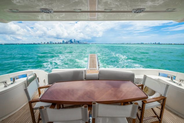 62ft Azimut Alana Rose Miami smooth boarding access to all entertainment areas with comfortable seating and table