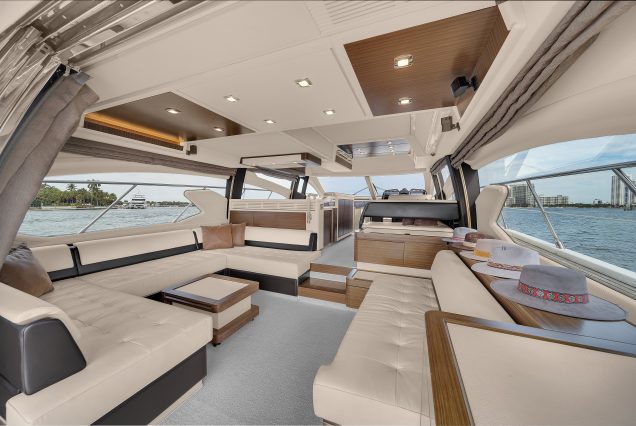 65ft NEPTUNES Yacht Miami sophisticated indoor salon with plush seating and elegant décor