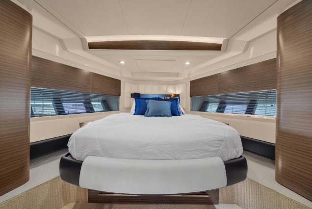 65ft NEPTUNES Yacht Miami guest cabin with elegant interiors and comfortable sleeping space