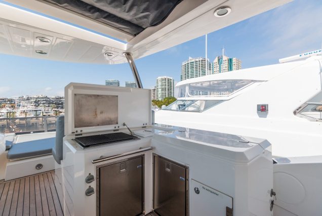 80ft Sunseeker Miami flybridge setup with bbq machine and premium social space