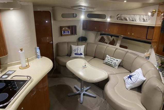 44ft Sea Ray Harmony Miami stylish lounge with table for entertainment and relaxation
