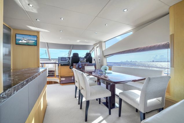 75ft Sunseeker M4 Predator Miami contemporary lounge with refined table setting