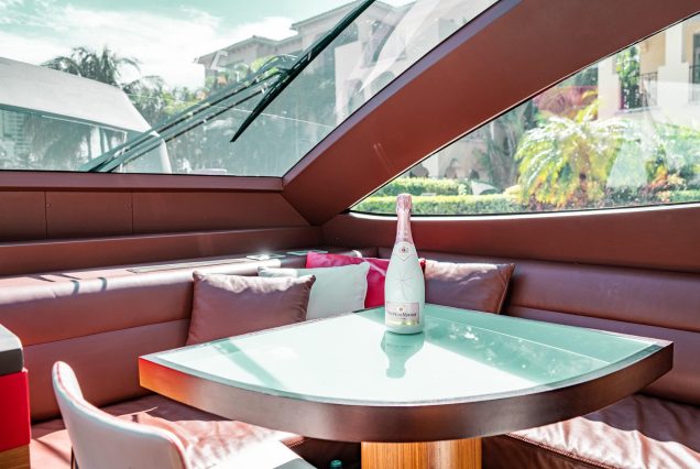El-Patron 86ft Astondoa Miami stylish lounge with table for entertainment and gatherings