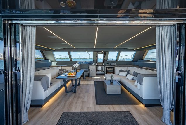 Sunreef 70ft ARCHIPIELAGO Miami luxury lounge with table for refined social gatherings